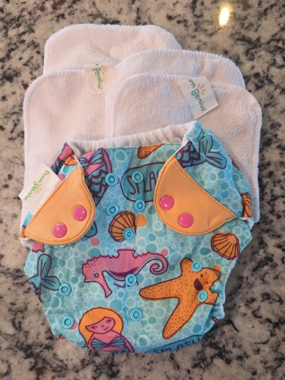 BumGenius Aqua Mermaid & Sea Life Print Cloth Diaper with Orange Trim